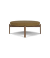 Passage Pouf by Audo in walnut with an ochre-brown upholstered seat, front view – In Dubai by WSPR