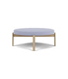 Passage Pouf by Audo in natural oak with a light lilac upholstered seat, front view – In Dubai by WSPR