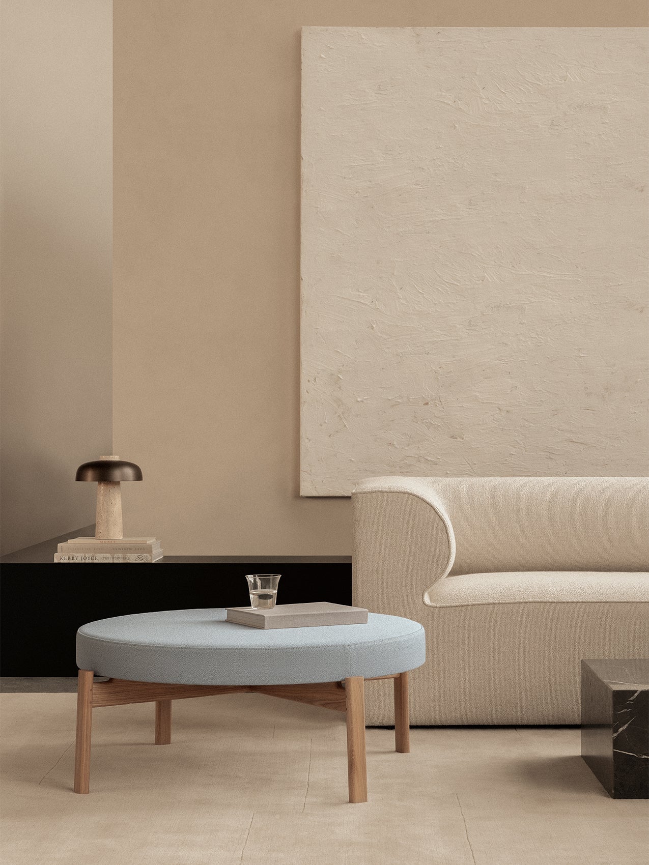 Passage Pouf by Audo styled in a neutral living room with a pale blue seat beside a modular sofa – In Dubai by WSPR
