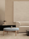 Passage Pouf by Audo styled in a neutral living room with a pale blue seat beside a modular sofa – In Dubai by WSPR