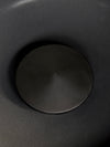 Meira Oil Lantern by Audo in black, detail of the oil chamber cap, top view – In Dubai by WSPR