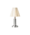 Admiral Portable Lamp by Audo in chrome with a raw linen shade, front view, lit – In Dubai by WSPR