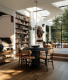 Arc Dining Table, Ø120 by 101 Copenhagen in Coffee Black Oak in a styled interior, view 3 – In Dubai by WSPR