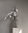 Bakku Vase, Big by 101 Copenhagen in Smoked Desert in a styled interior, view 2 – In Dubai by WSPR