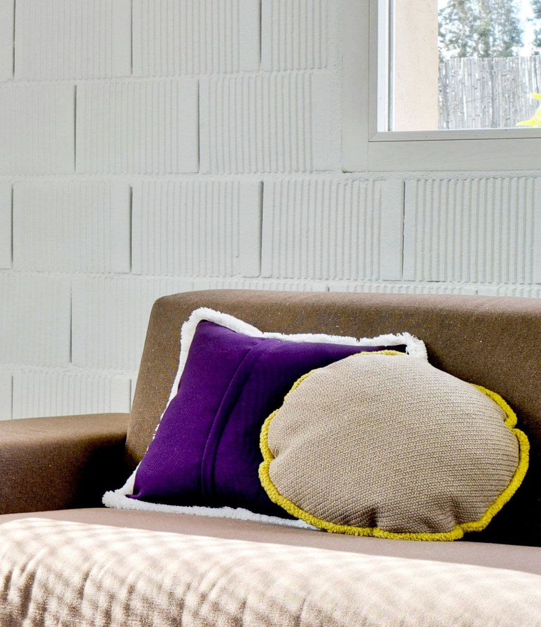 Bang! Cushion by Sancal on a sofa – In Dubai by WSPR