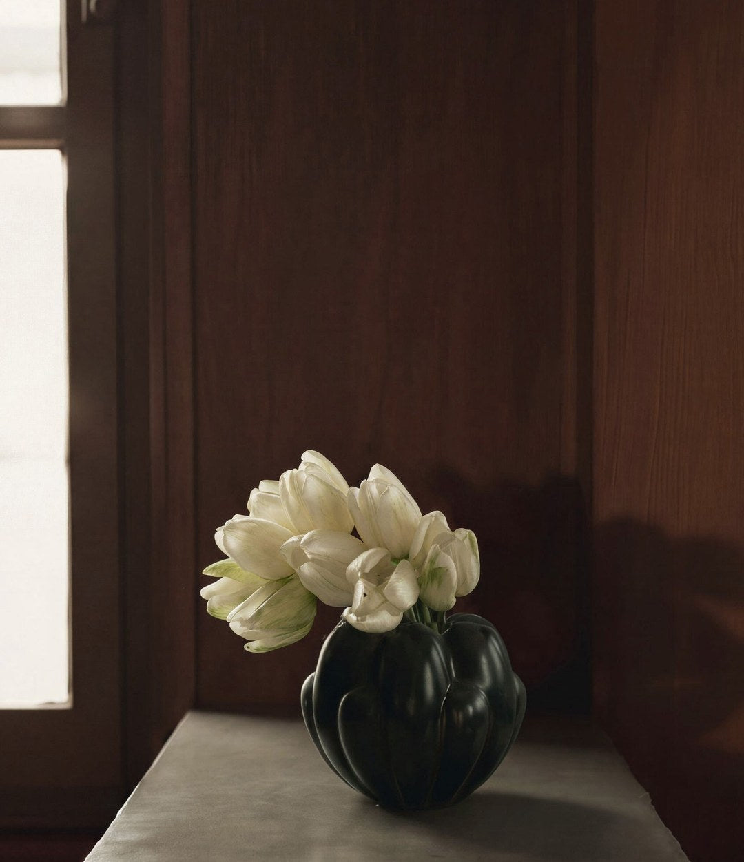 Bloom Vase, Petit by 101 Copenhagen in Dark Green in a styled interior – In Dubai by WSPR