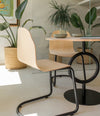 Body Chair by Sancal with a cantilever base in a dining room – In Dubai by WSPR