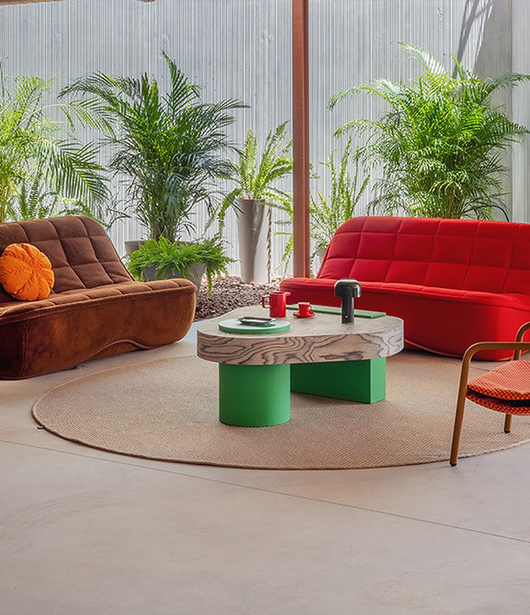 Bold Coffee Table by Sancal 100 × 100 cm Designer's Edition among red sofas – In Dubai by WSPR