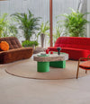 Bold Coffee Table by Sancal 100 × 100 cm Designer's Edition among red sofas – In Dubai by WSPR