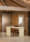 Bonbon Desk by Miniforms styled in cream lacquer in a loft workspace with exposed brick – In Dubai by WSPR