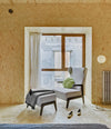 Boomerang Chill Wing Armchair by Sancal in light grey in a bedroom – In Dubai by WSPR