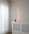 Bow Floor Lamp by 101 Copenhagen in Bronze in a styled interior, view 2 – In Dubai by WSPR
