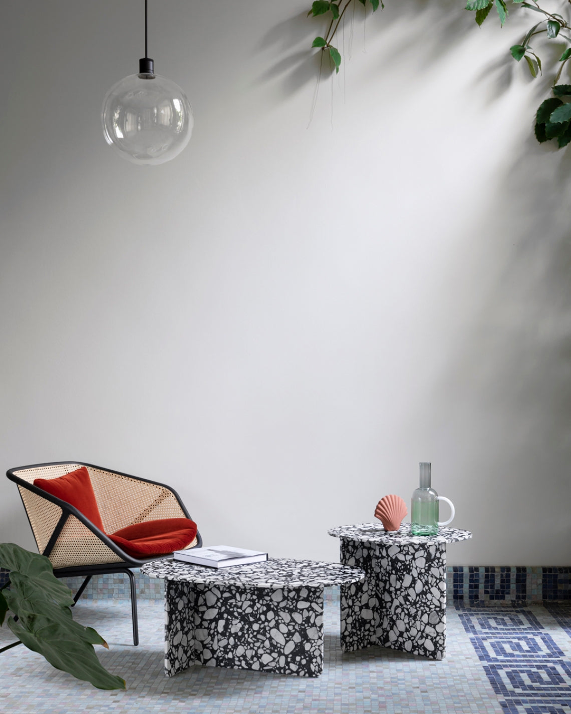 Chap Coffee Table by Miniforms in Palladio Moro marble, styled beside a lounge chair with a glass pendant – In Dubai by WSPR