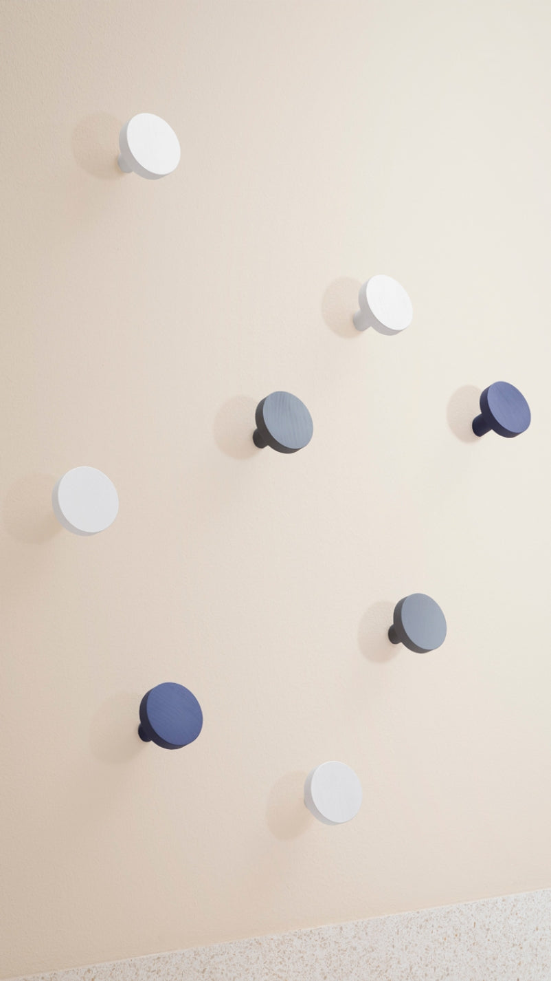 Chiodo Hanger by Miniforms styled as a scattered arrangement of pegs on a soft pink wall – In Dubai by WSPR