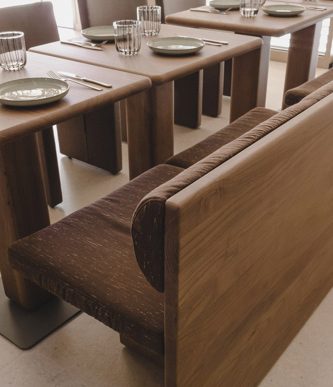 Cita Bench by Sancal wooden benches in a restaurant – In Dubai by WSPR