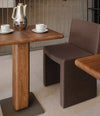 Cita Bistro Table by Sancal with a chair in a restaurant – In Dubai by WSPR