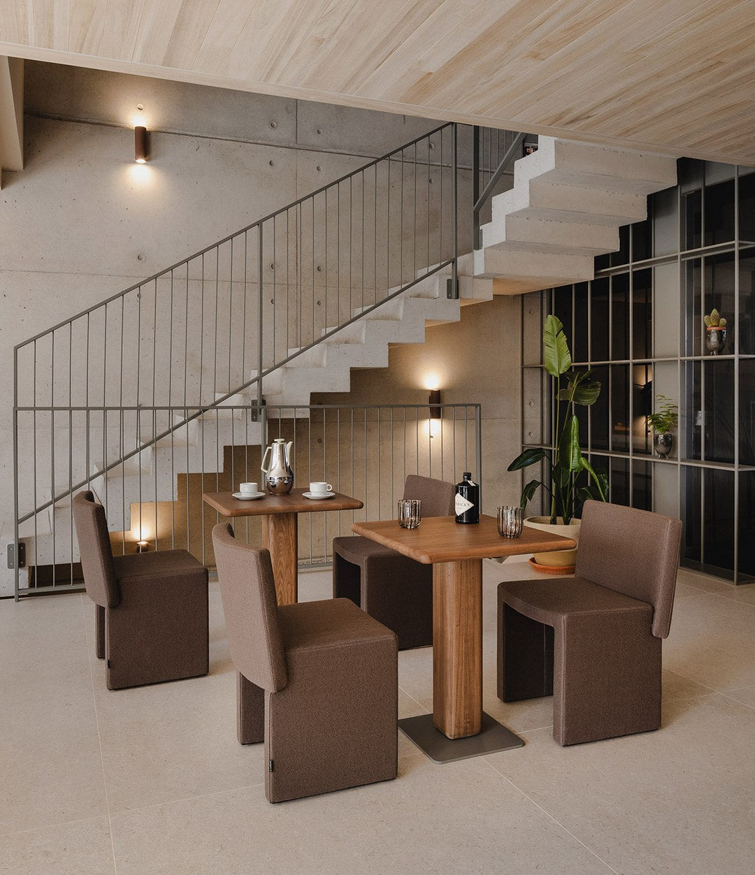 Cita Bistro Table by Sancal with chairs in a restaurant – In Dubai by WSPR