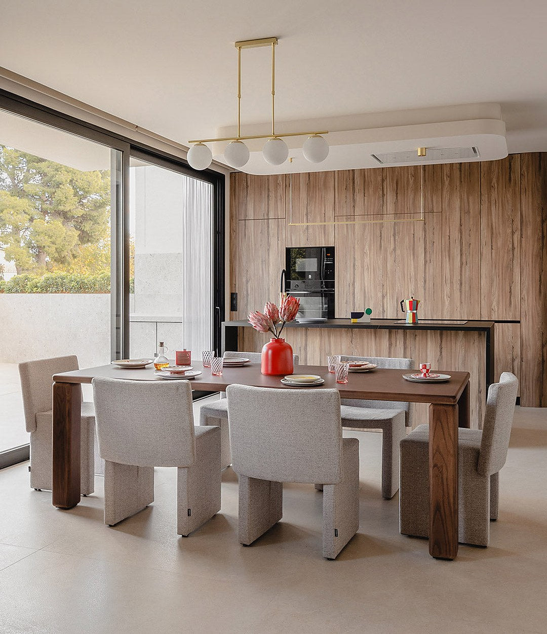 Cita Chair by Sancal in grey around a dining table – In Dubai by WSPR