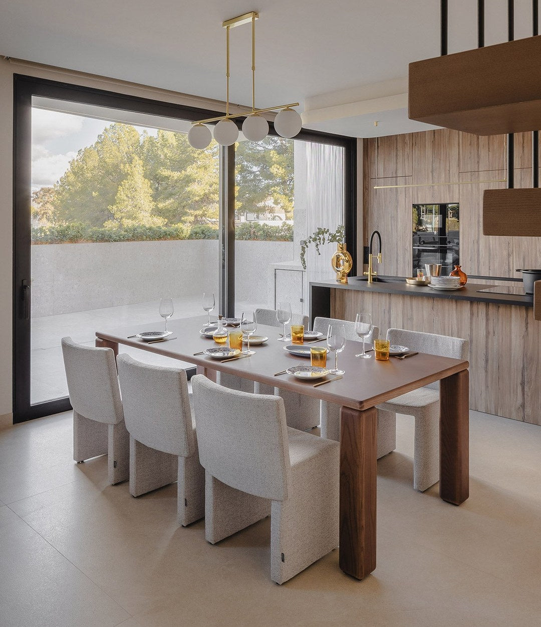 Cita Dining Table by Sancal with grey chairs in a dining room – In Dubai by WSPR