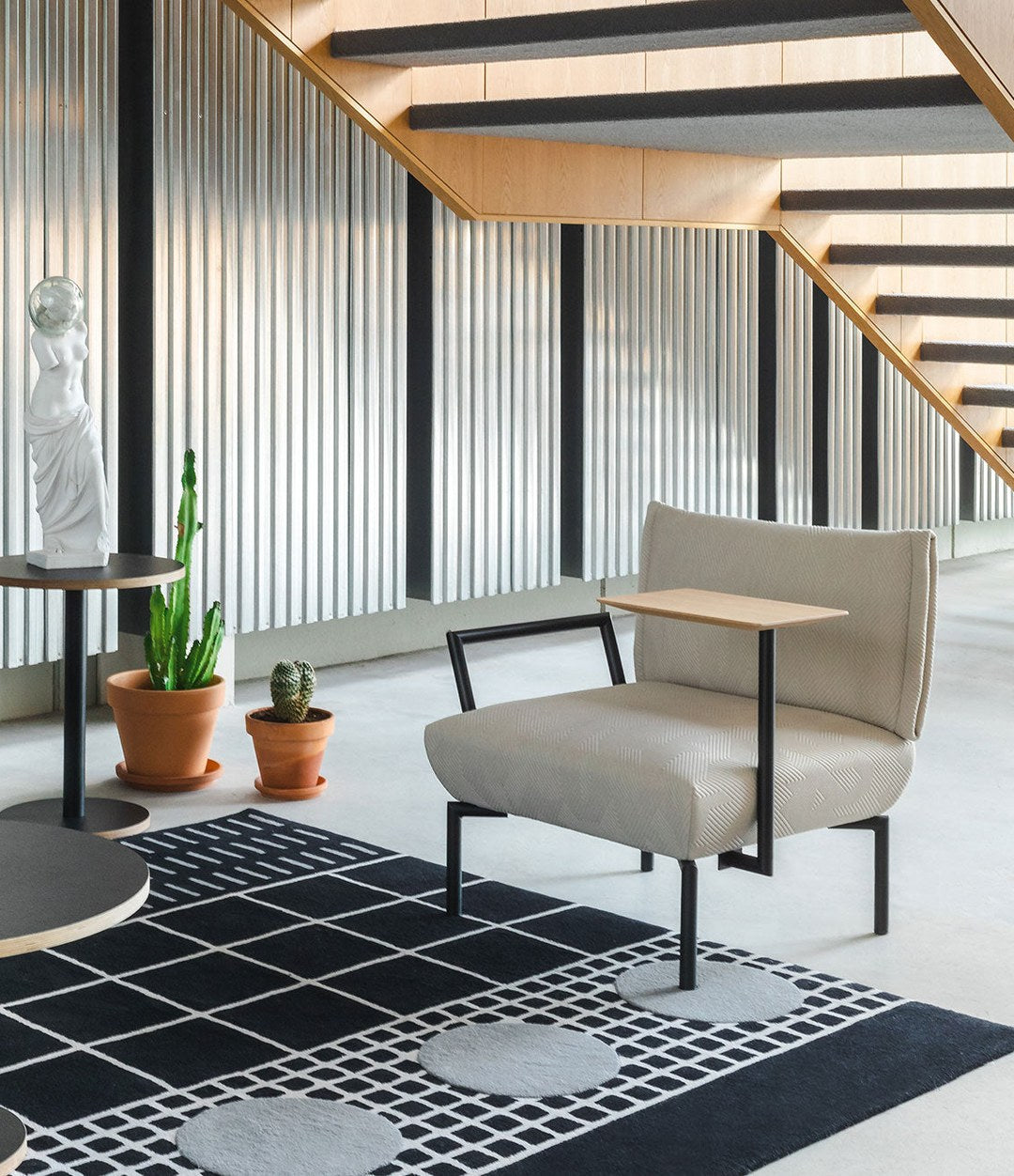 Click Modular Sofa by Sancal armchair with the oak side table in a lounge – In Dubai by WSPR