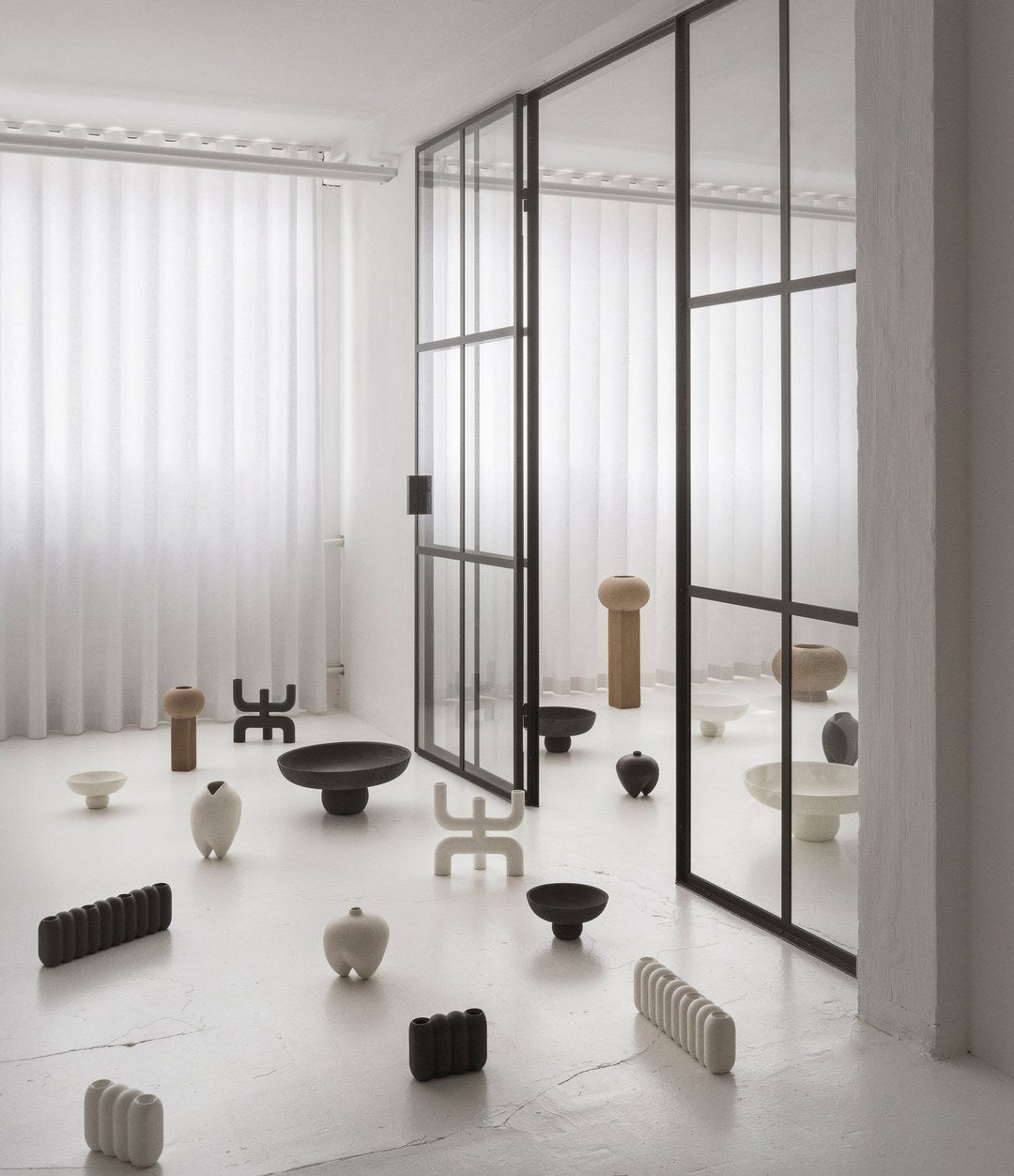 Cobra Candle Holder by 101 Copenhagen in Bone White in a styled interior, view 2 – In Dubai by WSPR