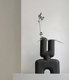 Cobra Vase Double, Medio by 101 Copenhagen in Coffee in a styled interior – In Dubai by WSPR