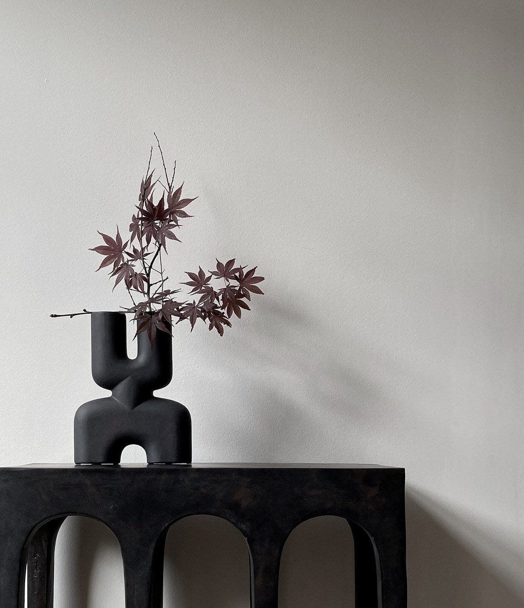 Cobra Vase Double, Mini by 101 Copenhagen in Coffee in a styled interior – In Dubai by WSPR