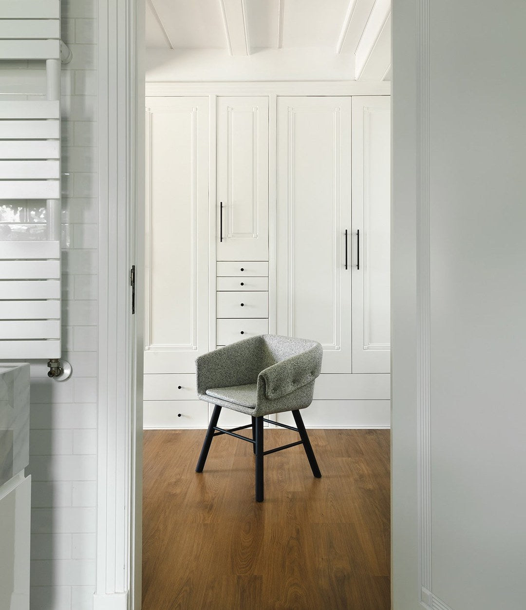 Collar Chair by Sancal in a bedroom doorway – In Dubai by WSPR
