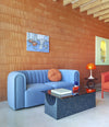 Core Sofa by Sancal in blue with a red armchair – In Dubai by WSPR