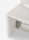 Cubola Chair by Miniforms in cream textured fabric with a mirrored crossbar, three-quarter view – In Dubai by WSPR