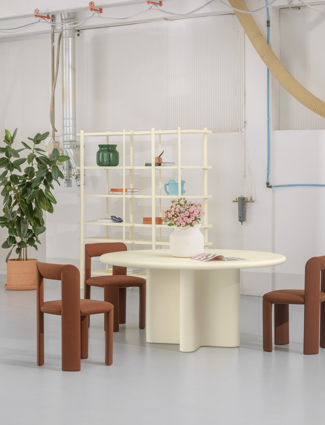 Cuoppo Vase by Miniforms in Verde baked clay, styled on open shelving in a bright studio – In Dubai by WSPR