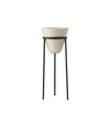 Daiza Planter by Audo in glazed ivory stoneware on a tall black iron stand, front view – In Dubai by WSPR