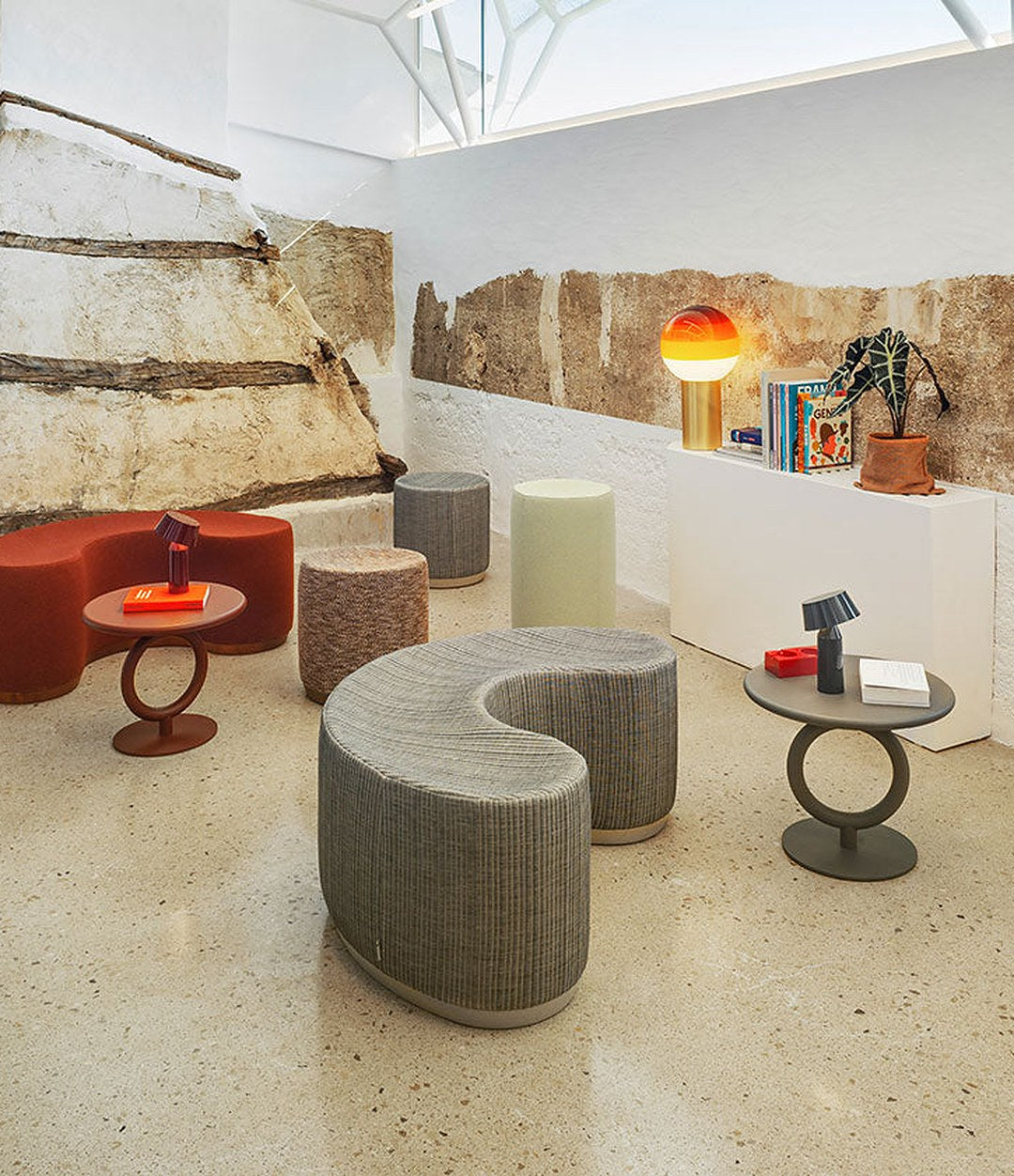 Dividuals Pouf by Sancal poufs in a gallery lounge – In Dubai by WSPR