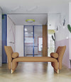 Diwan Bench by Sancal divan with arms in tan in a hallway – In Dubai by WSPR
