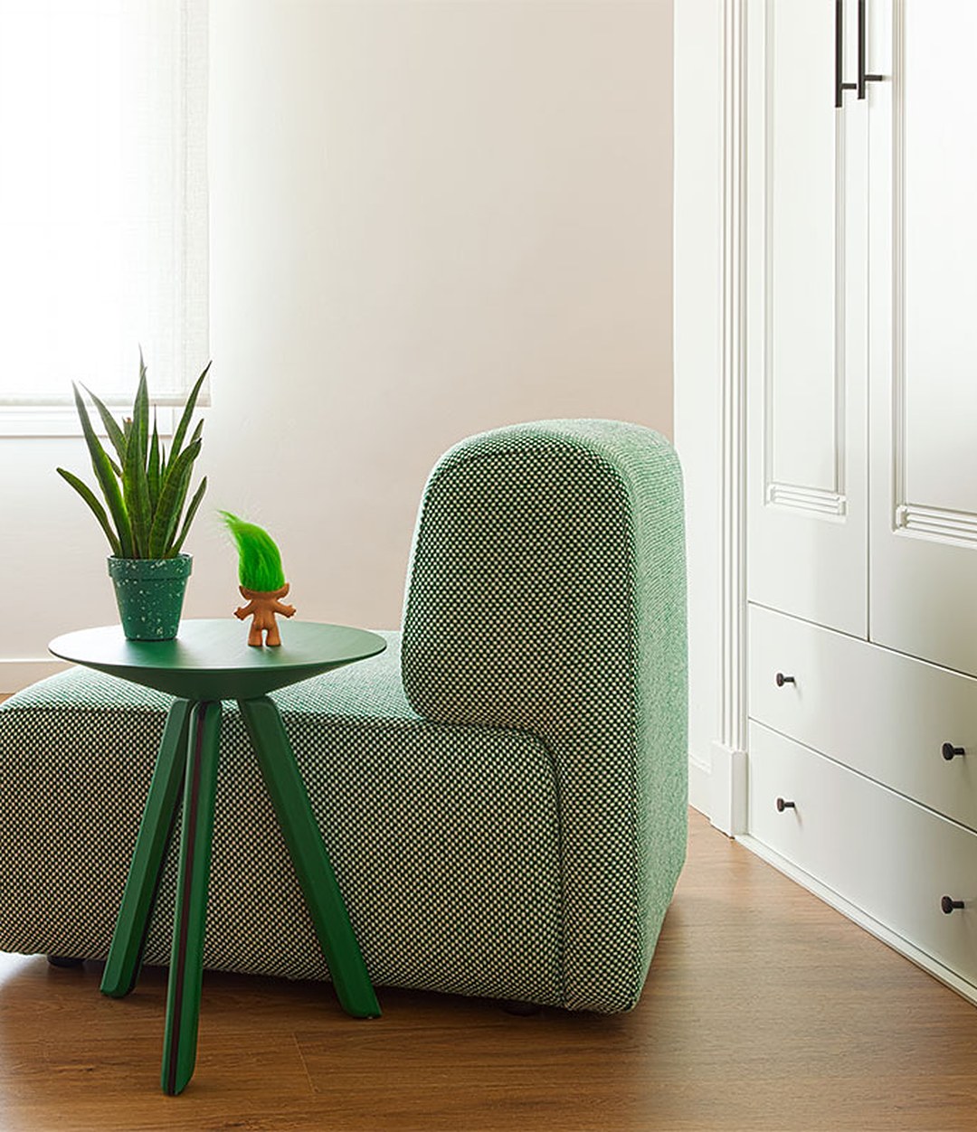 Duo Mini Armchair by Sancal in sage green by a wardrobe – In Dubai by WSPR