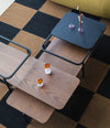 Duplex Coffee Table by Sancal from above on a checked rug – In Dubai by WSPR