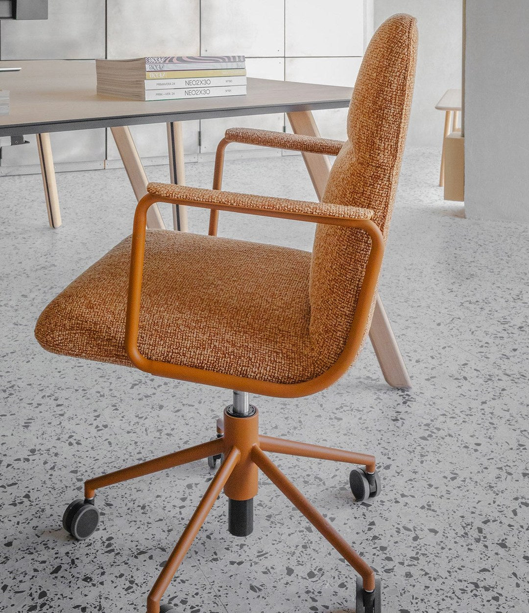 Elle Executive Chair by Sancal in orange at a desk – In Dubai by WSPR