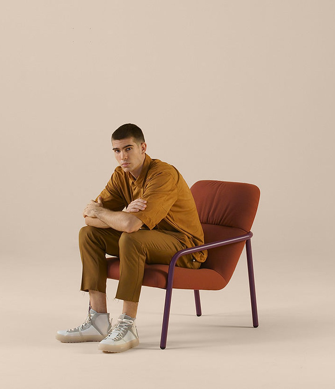 Elle Lounge Chair by Sancal in red, seated – In Dubai by WSPR