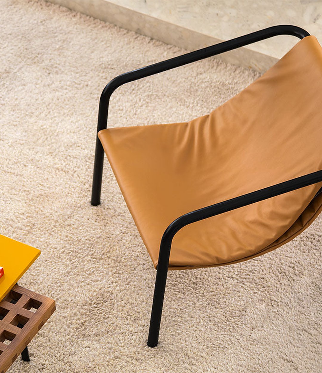 Elle Mini Lounge Chair by Sancal in tan leather on a rug – In Dubai by WSPR