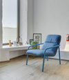 Elle Wing Chair by Sancal in blue by a window – In Dubai by WSPR