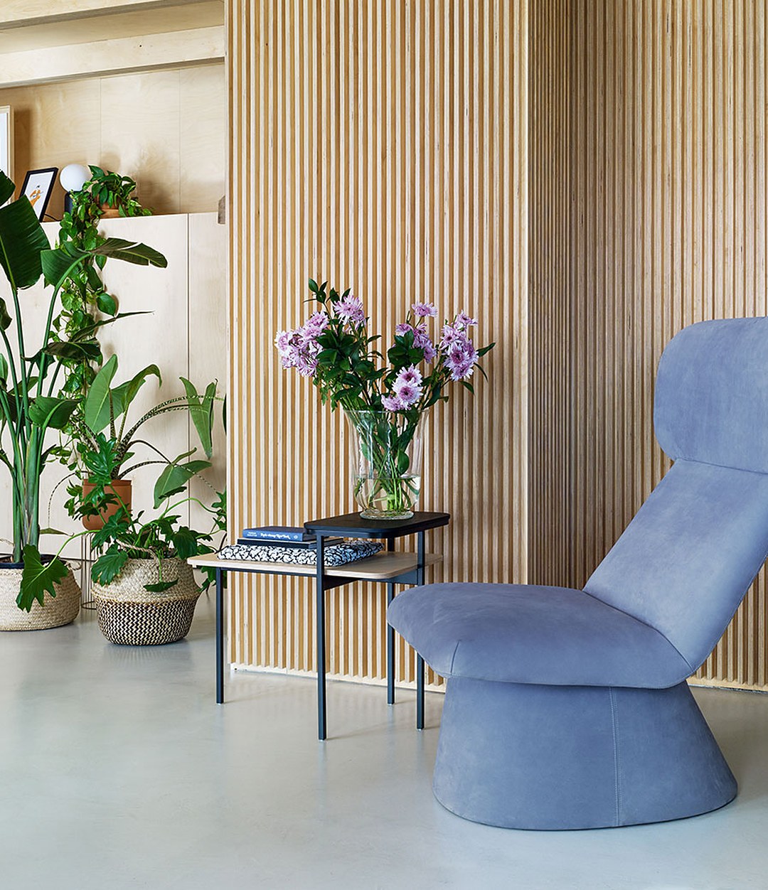Elle Wing Chair by Sancal in blue among plants – In Dubai by WSPR