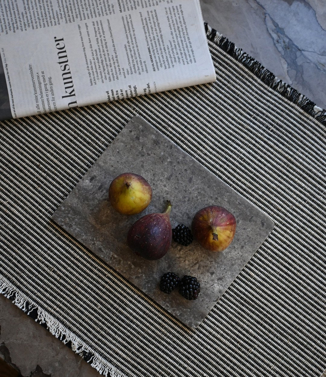 Enkei Tray Rectangular, Petit by 101 Copenhagen in Silver Travertine in a styled interior, view 2 – In Dubai by WSPR