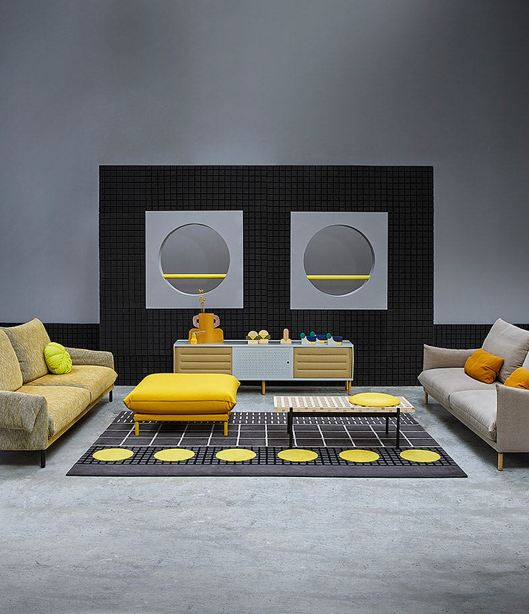 Estante Acoustic Shelving by Sancal low units beside sofas in a lounge – In Dubai by WSPR