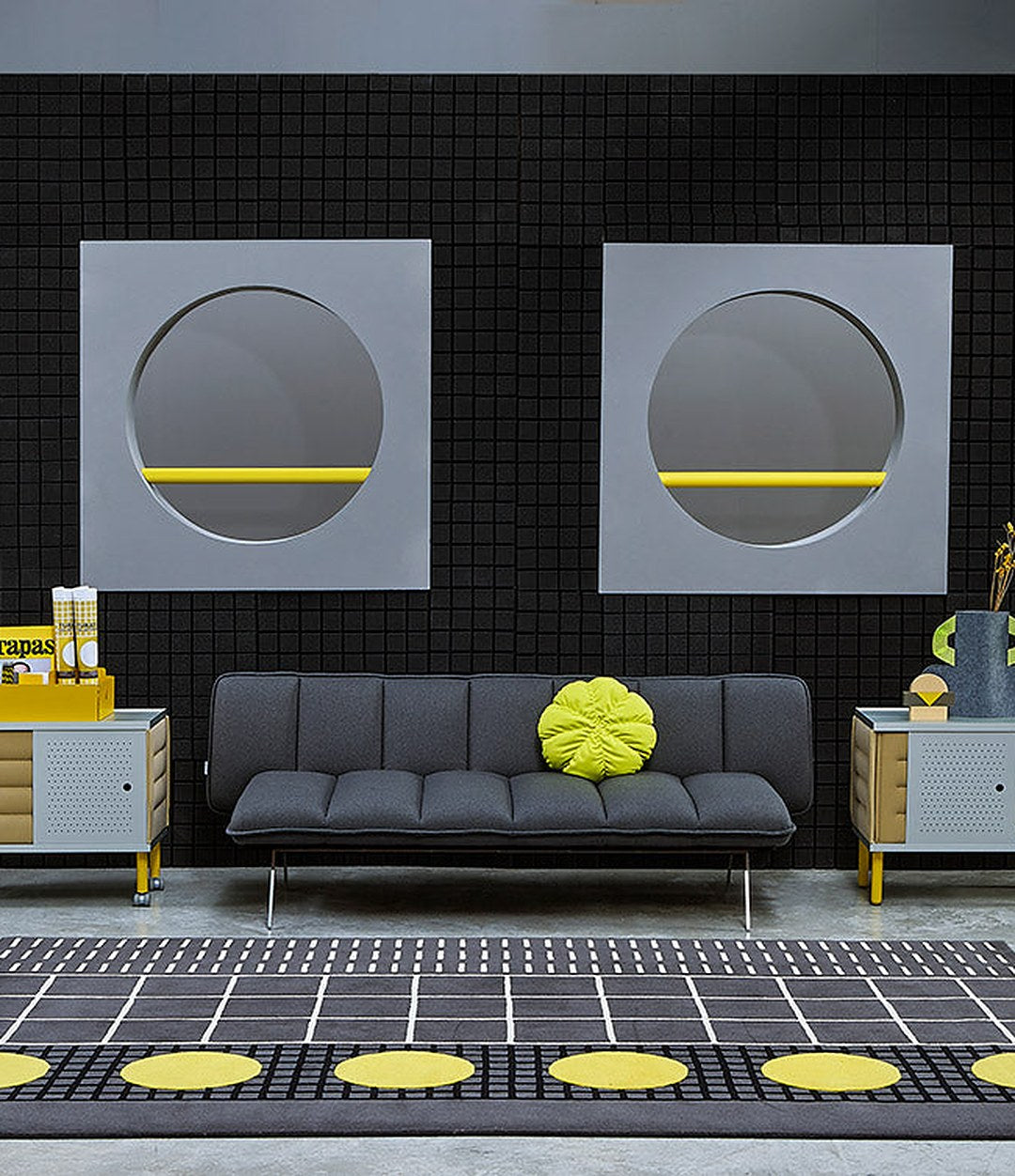 Estante Acoustic Shelving by Sancal low units beside a black sofa – In Dubai by WSPR