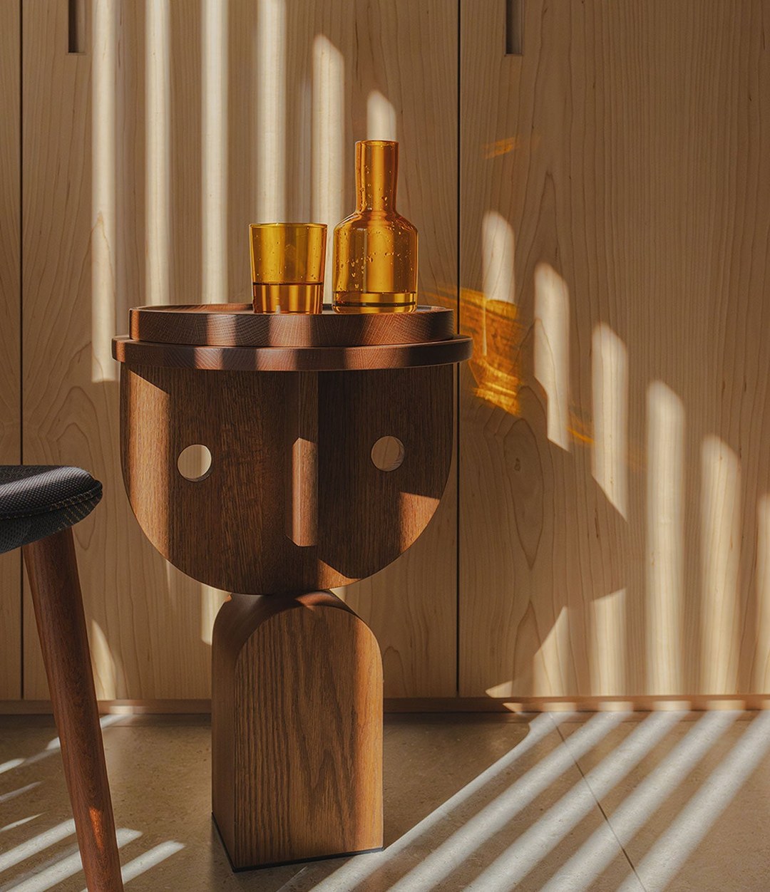 Faces Side Table by Sancal in dark oak in warm light – In Dubai by WSPR