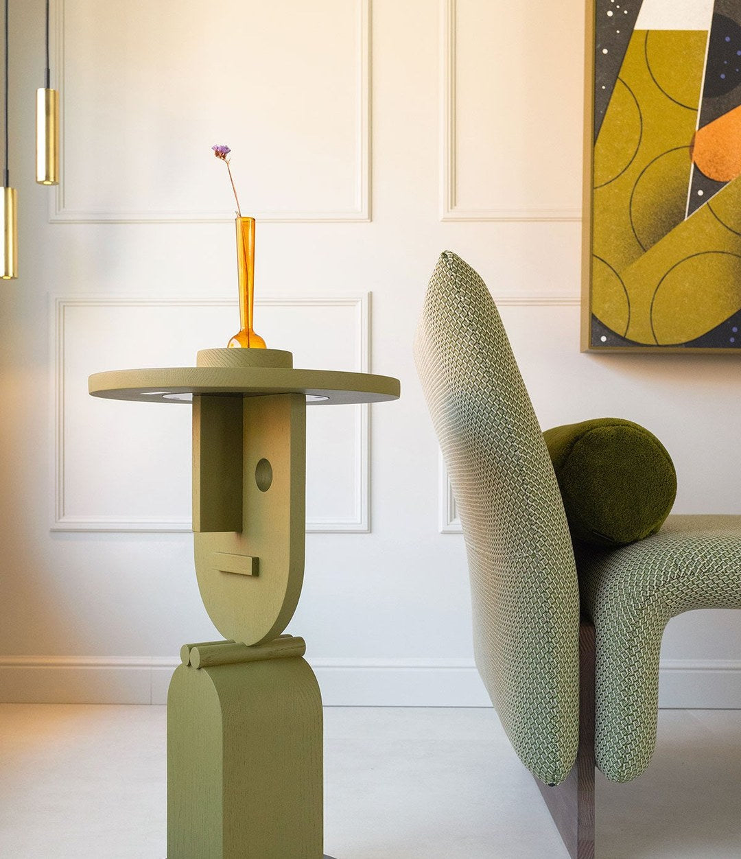 Faces Side Table by Sancal in olive green by a lounge chair – In Dubai by WSPR