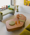 Faces Side Table by Sancal in green in a colourful lounge – In Dubai by WSPR