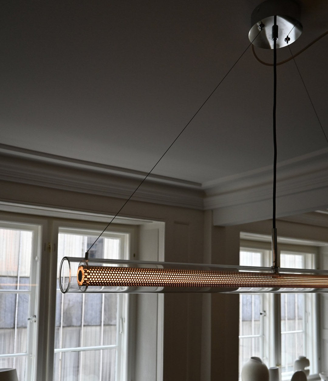 Frame Pendant Lamp by 101 Copenhagen in Chrome in a styled interior, view 3 – In Dubai by WSPR