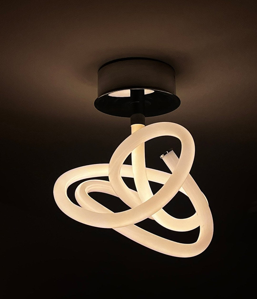 Ghost Ceiling Lamp by 101 Copenhagen in Chrome in a styled interior, view 2 – In Dubai by WSPR