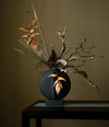 Guggenheim Vase, Mini by 101 Copenhagen in Black in a styled interior – In Dubai by WSPR